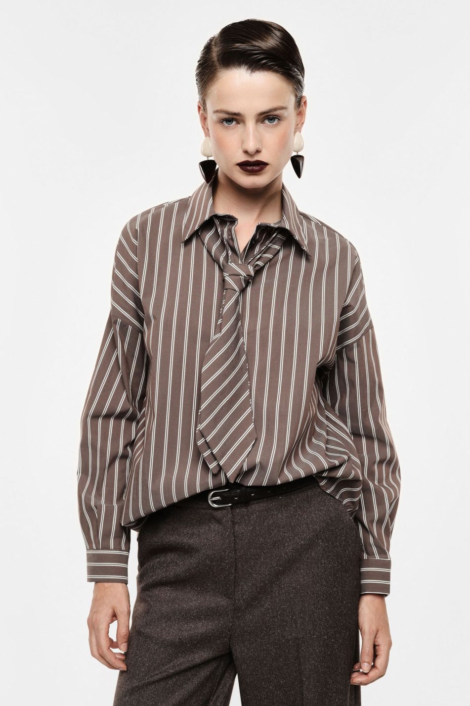 Striped shirt with coordinated tie accent