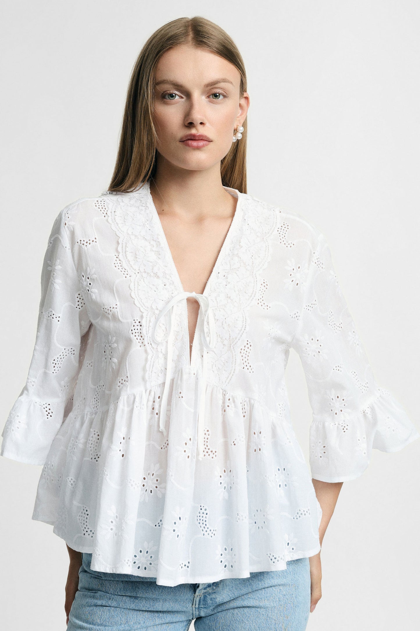 Blouse with broderie anglaise and flared sleeves