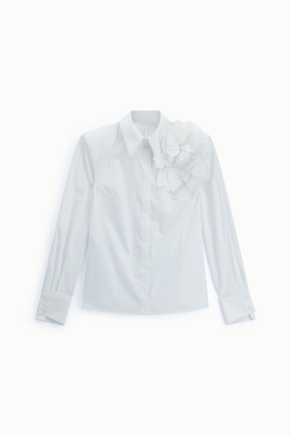 Shirt with flower appliqué and extended cuffs