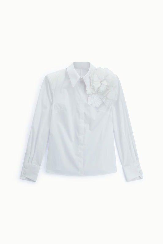 Shirt with flower appliqué and extended cuffs