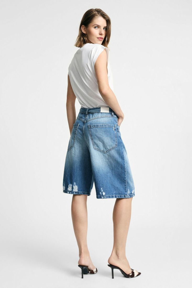Wide bermuda shorts with distressed details