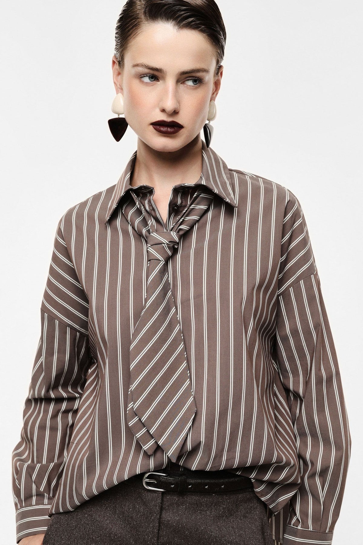 Striped shirt with coordinated tie accent