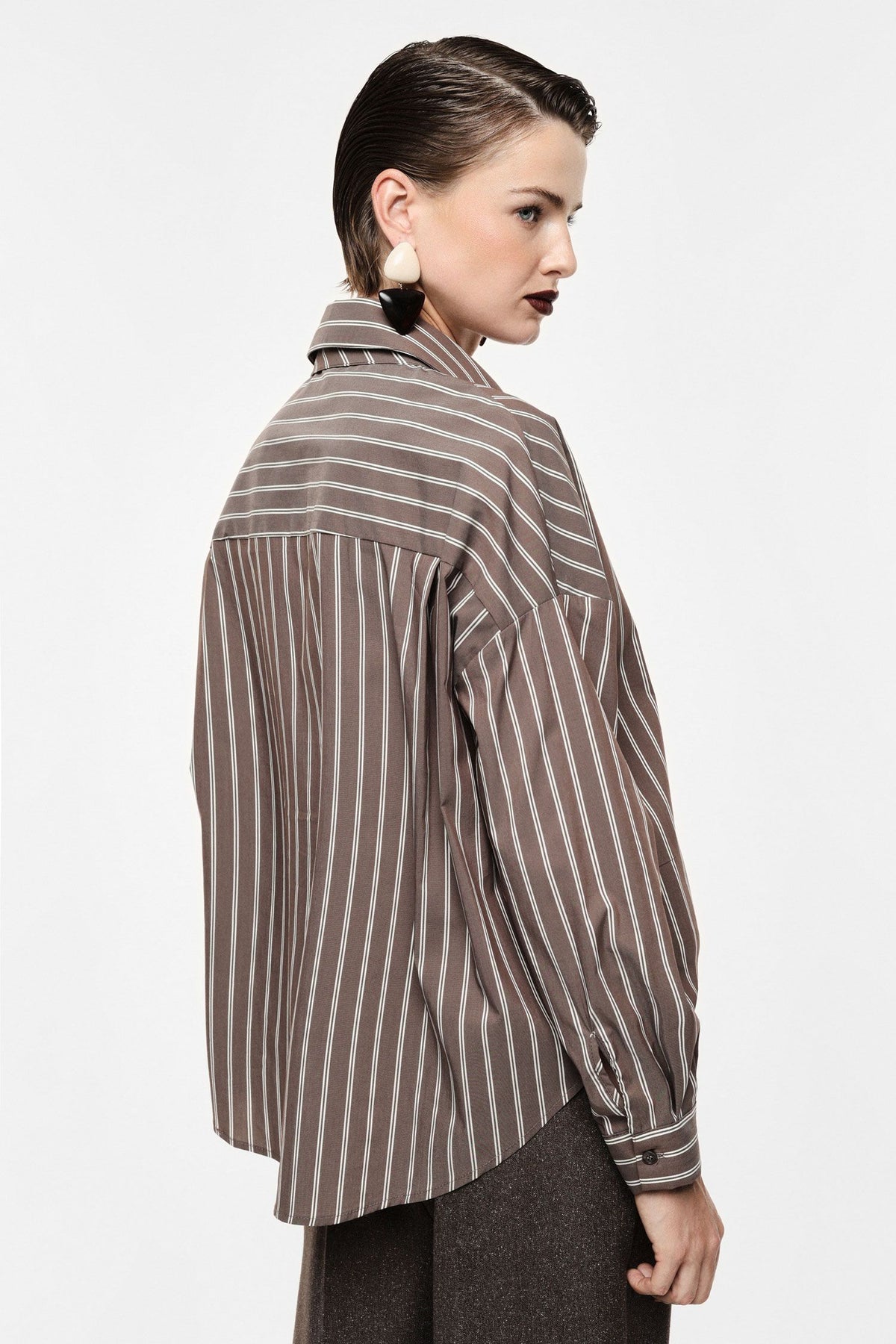 Striped shirt with coordinated tie accent