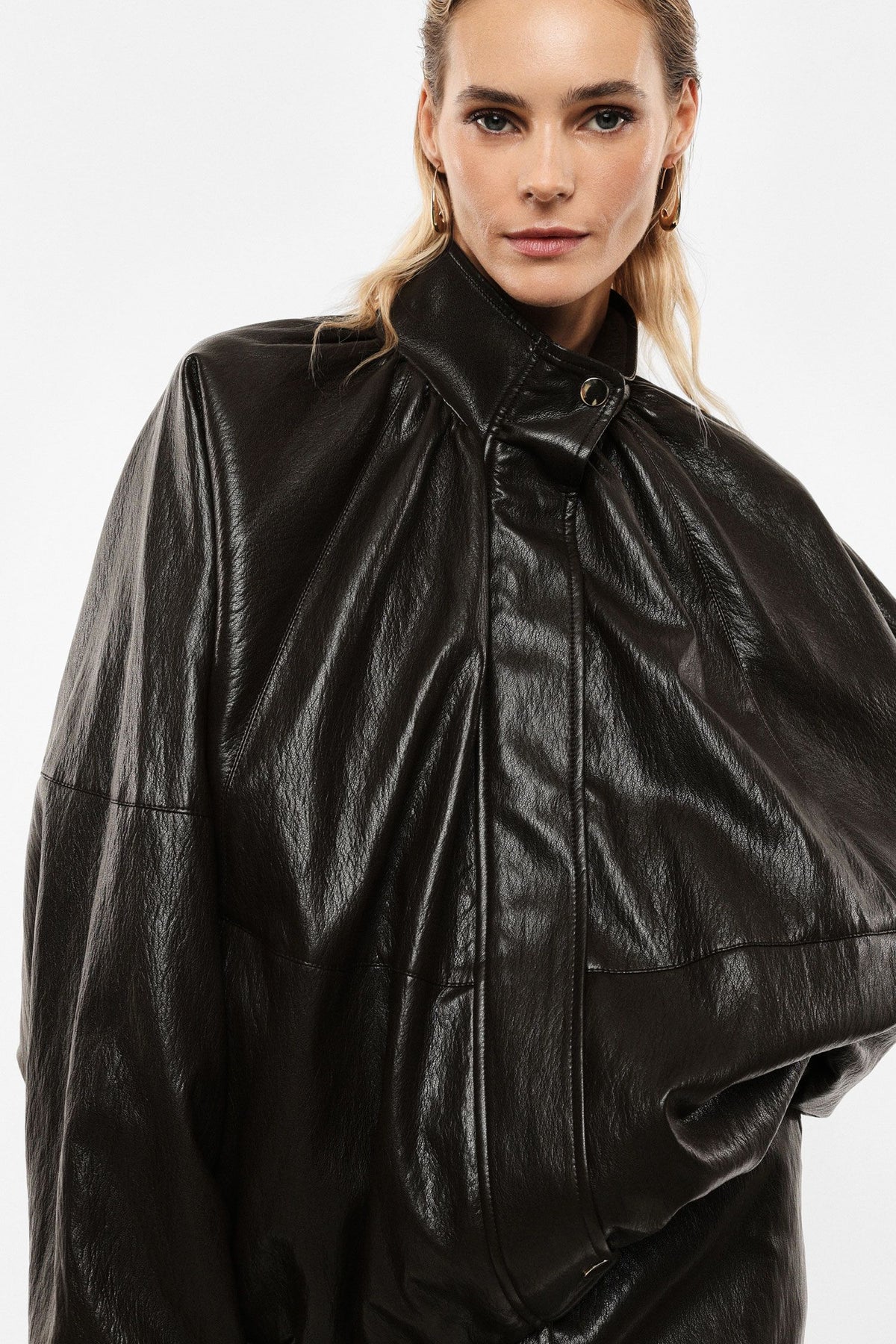 Short quilted jacket with stand collar