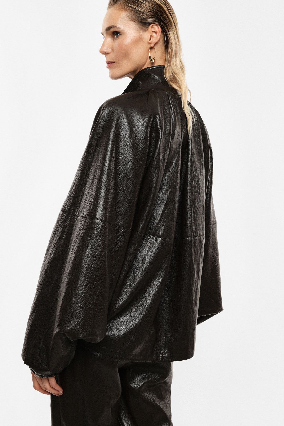 Short quilted jacket with stand collar