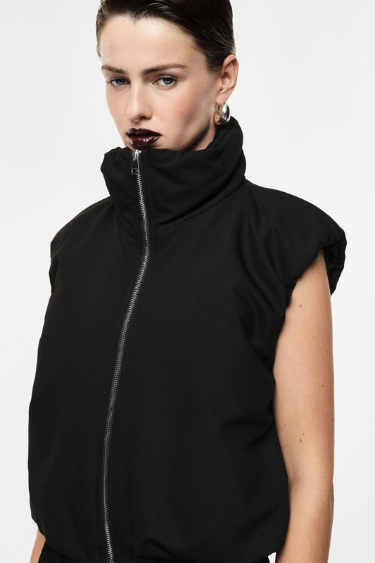 Sleeveless jacket with zip closure and high collar